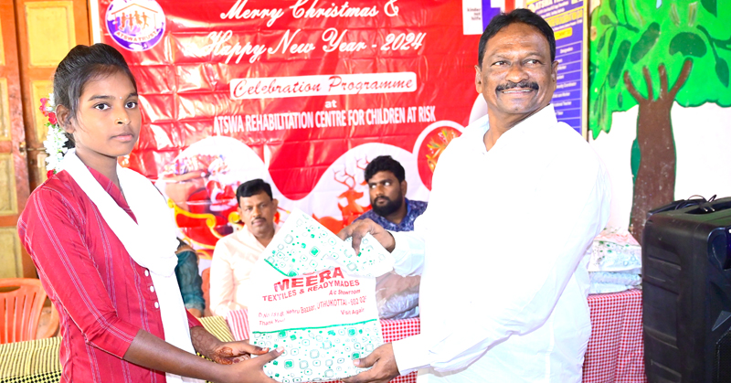 Child receiving support at ATSWA event